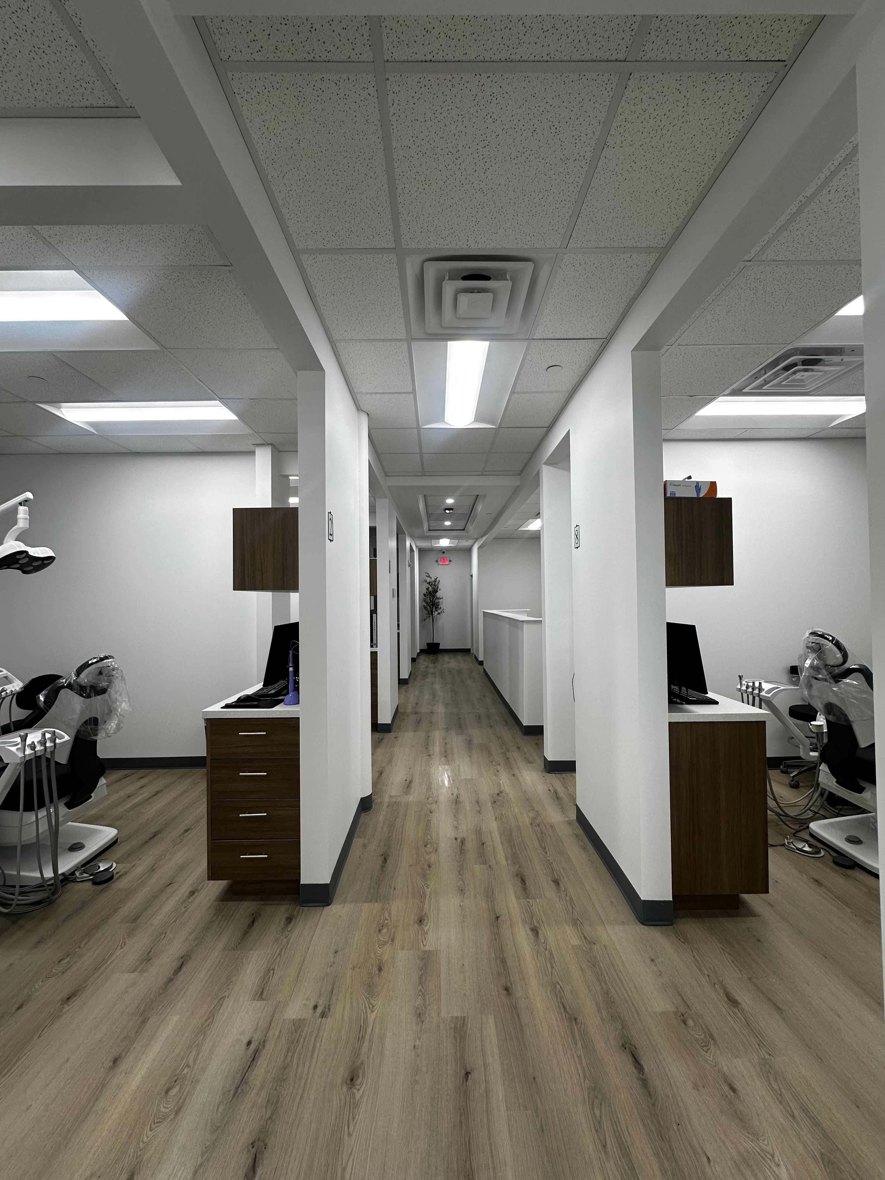 AURA Dental modern office hallway with treatment rooms serving the greater Milwaukee WI area